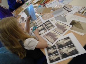 Photograph of a child creating an artwork at one of the sessions run by Comics Youth